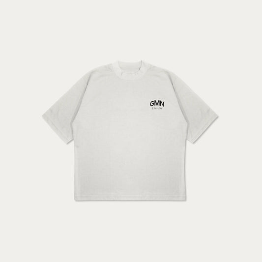 Short sleeve heavyweight jersey t-shirt in White. Slightly oversized fit with a ribbed crewneck collar. GMN graphic branding to the rear and chest.  Oversized Fit Screen Printed Short sleeves Composition: 100% Organic Cotton 240GSM Made in Portugal